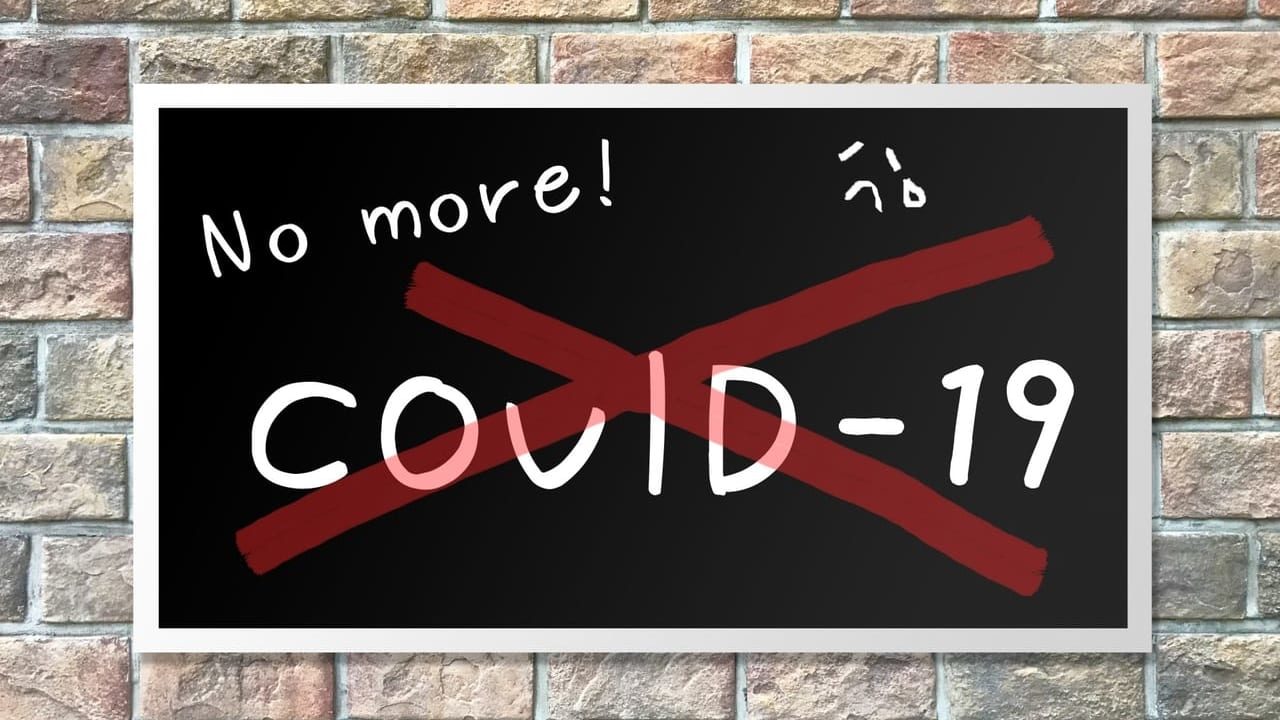「No more！COVID-19」と書かれた黒板